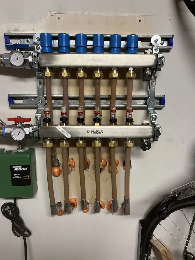 Plumber performing Gas Line Installation at a residential property in Johnson